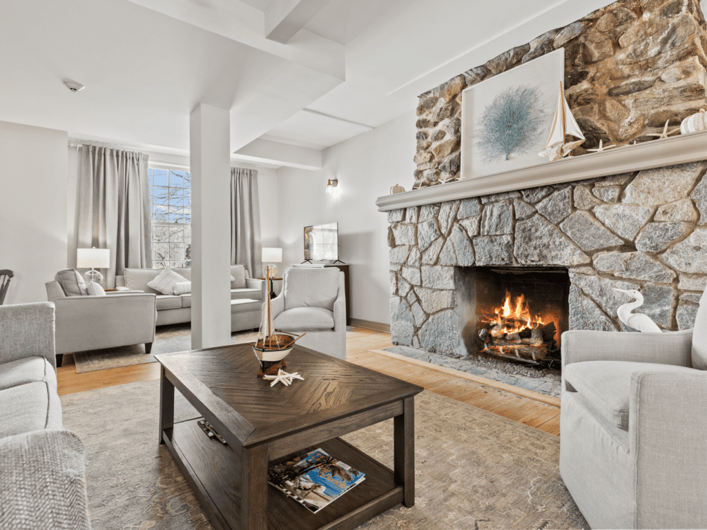 Image of great room with fireplace and coffee table