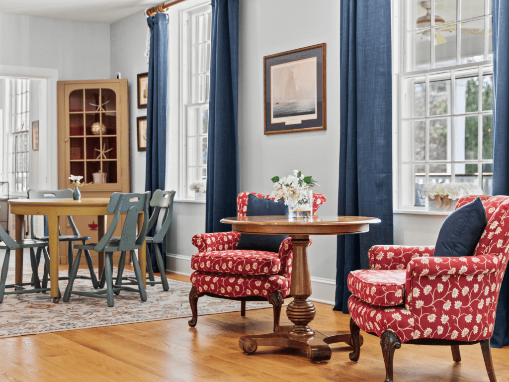 Image of red arm chairs and table